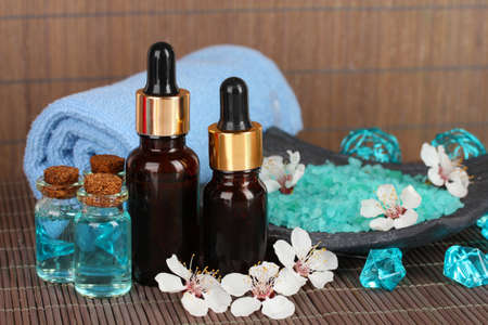 Spa composition with aroma oils on table close-upの写真素材