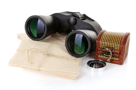 Black modern binoculars with old letters isolated on whiteの写真素材