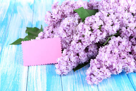Beautiful lilac flowers on table close-upの写真素材