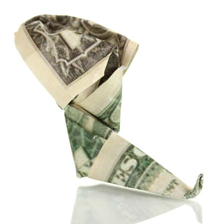 Dollar folded into boots isolated on whiteの写真素材