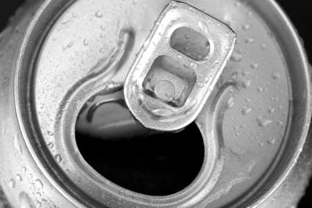 Aluminum can with water drops isolated on blackの写真素材