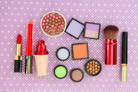 Decorative cosmetics on purple backgroundの写真素材