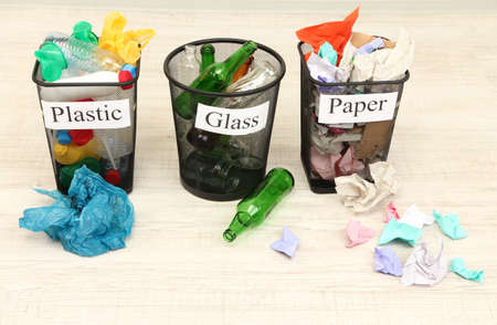 Buckets for waste sorting on room backgroundの写真素材