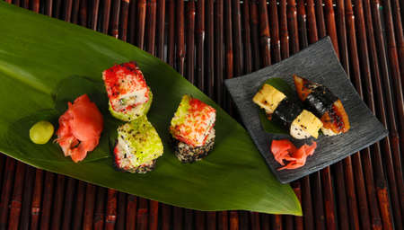 Tasty Maki sushi - Roll on bamboo matの写真素材