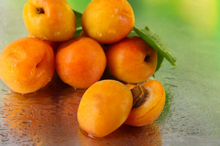 Apricots on metal backgroundの写真素材