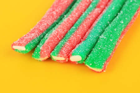 Sweet jelly candies on yellow background
の写真素材