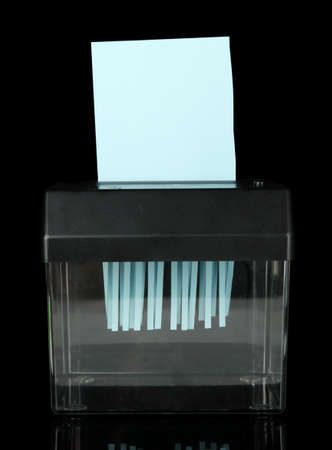 Paper shredder machine, isolated on blackの写真素材