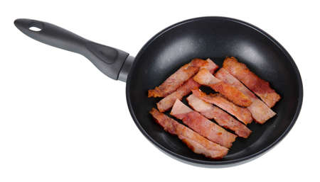 Fried bacon in frying pan  isolated on whiteの写真素材
