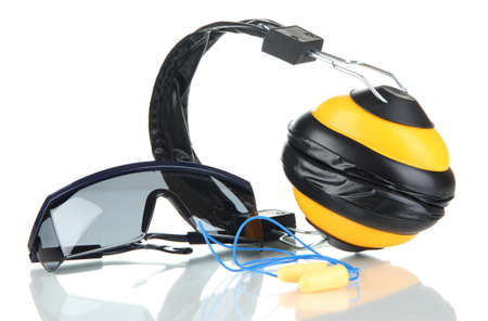 Eyeglasses tools and headphones isolated on whiteの写真素材