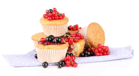 Tasty muffins with berries isolated on whiteの写真素材