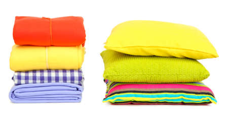 Bright pillows and plaids, isolated on whiteの写真素材