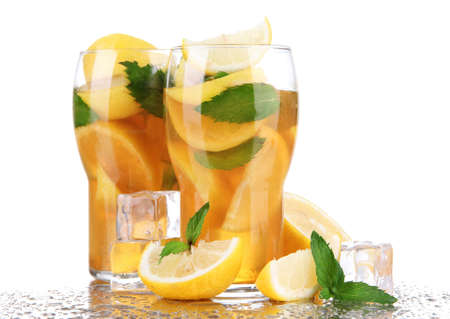 Iced tea with lemon and mint isolated on whiteの写真素材