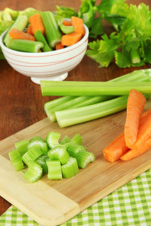 Fresh green celery with vegetables on table close-upの写真素材
