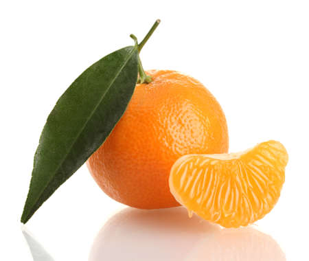 Ripe sweet tangerine with leaf, isolated on whiteの写真素材