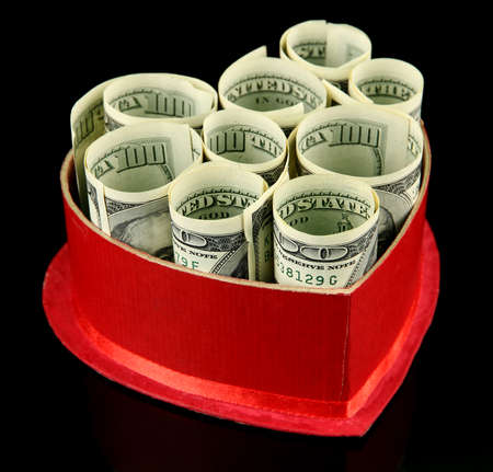 Money in gift box on dark color  backgroundの写真素材