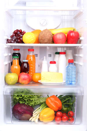Refrigerator full of foodの写真素材
