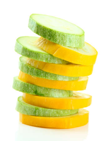 Sliced raw zucchini, isolated on whiteの写真素材