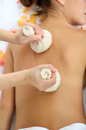 Woman having back massage close upの写真素材