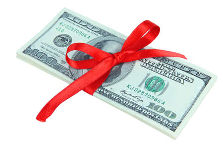 Dollars with gift bow isolated on whiteの写真素材