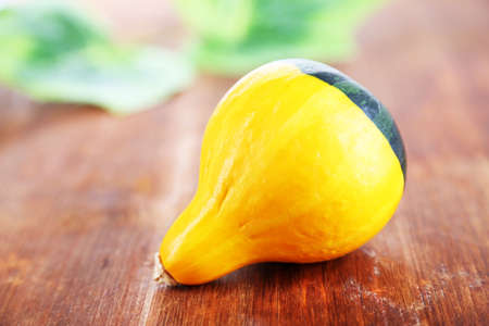 Small isolated on wooden table close-upの写真素材