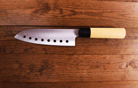Kitchen knife  on wooden backgroundの写真素材