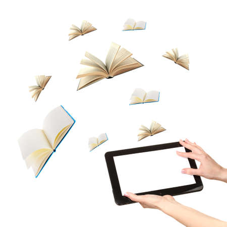 Tablet and opened books isolated on whiteの写真素材