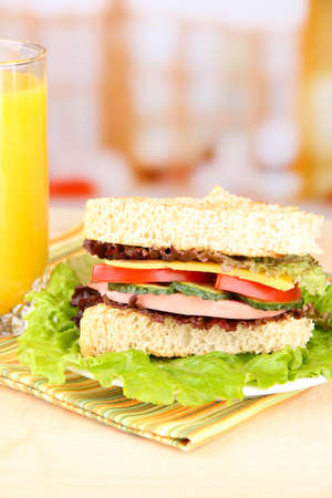 Fresh and tasty sandwich on plate on tableの写真素材