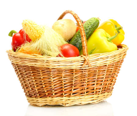 Fresh vegetables in basket isolated on whiteの写真素材