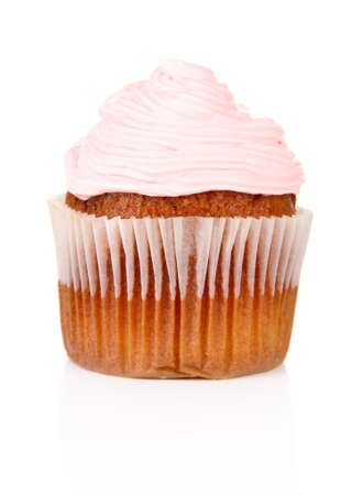 Tasty muffin with cream isolated on white の写真素材