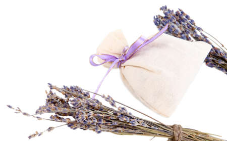 Textile sachet pouch with dried lavender flowers isolated on whiteの写真素材