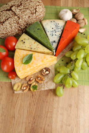 Different Italian cheese on wooden tableの写真素材