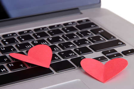 Red hearts on computer keyboard close upの写真素材