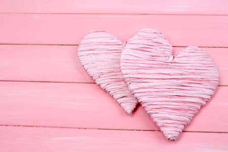 Decorative heart on wooden backgroundの写真素材