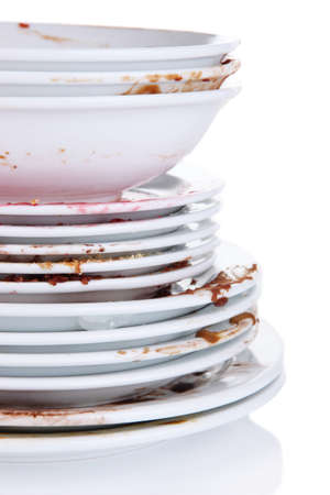 Dirty dishes isolated on whiteの写真素材