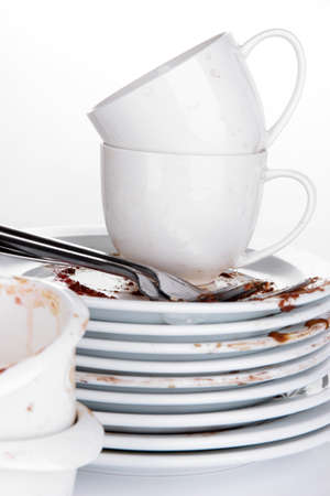 Dirty dishes isolated on whiteの写真素材