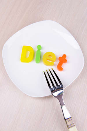 Plate with inscription on table close-upの写真素材