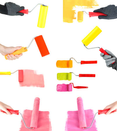 Roller brushes with color paint isolated on whiteの写真素材