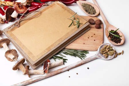 Different spices and cutting board, isolated on whiteの写真素材