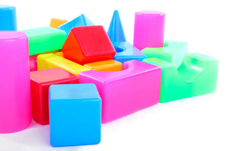 Colorful plastic toys isolated on whiteの写真素材