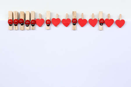 Abstract background with colorful wooden pins and paperの写真素材
