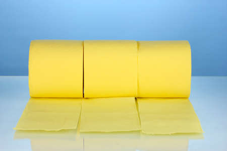 rolls of toilet paper on blue backgroundの写真素材