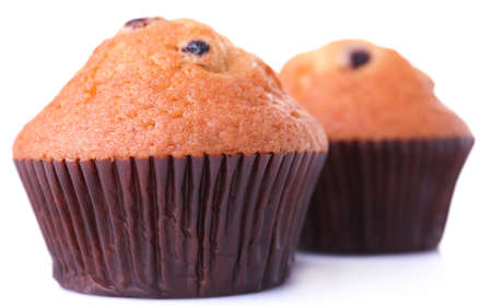 Blueberry muffins isolated on whiteの写真素材