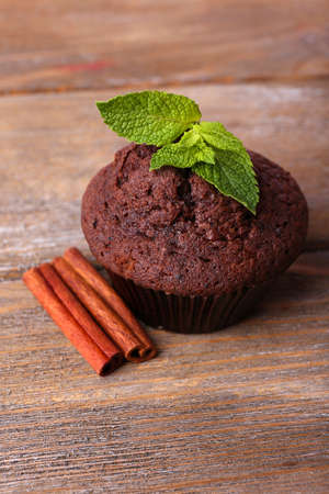 Chocolate muffin on wooden backgroundの写真素材