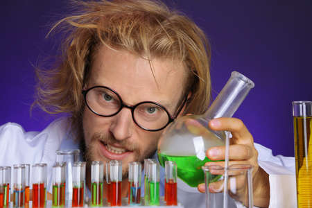 Crazy scientist working in laboratoryの写真素材