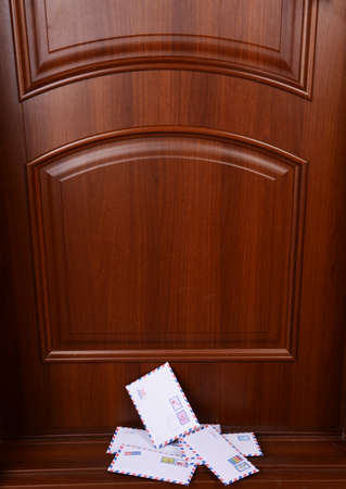 Letters on floor at front doorの写真素材