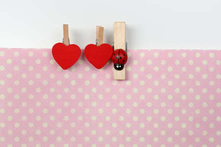 Abstract background with colorful wooden pins and paperの写真素材