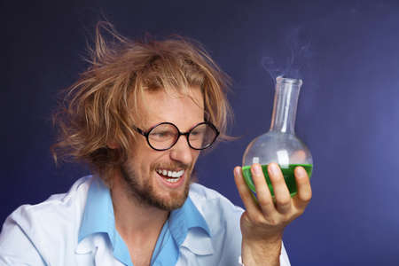 Crazy scientist working in laboratoryの写真素材