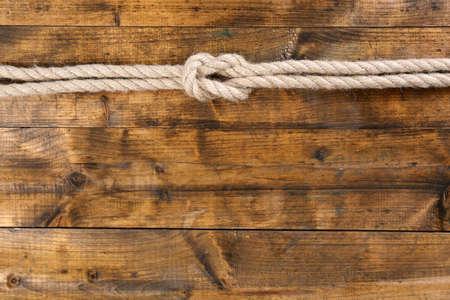 Marine knot on wooden backgroundの写真素材