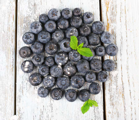 Blueberries on wooden background closeupの写真素材