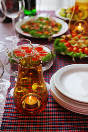Restaurant table setting with candlesの写真素材